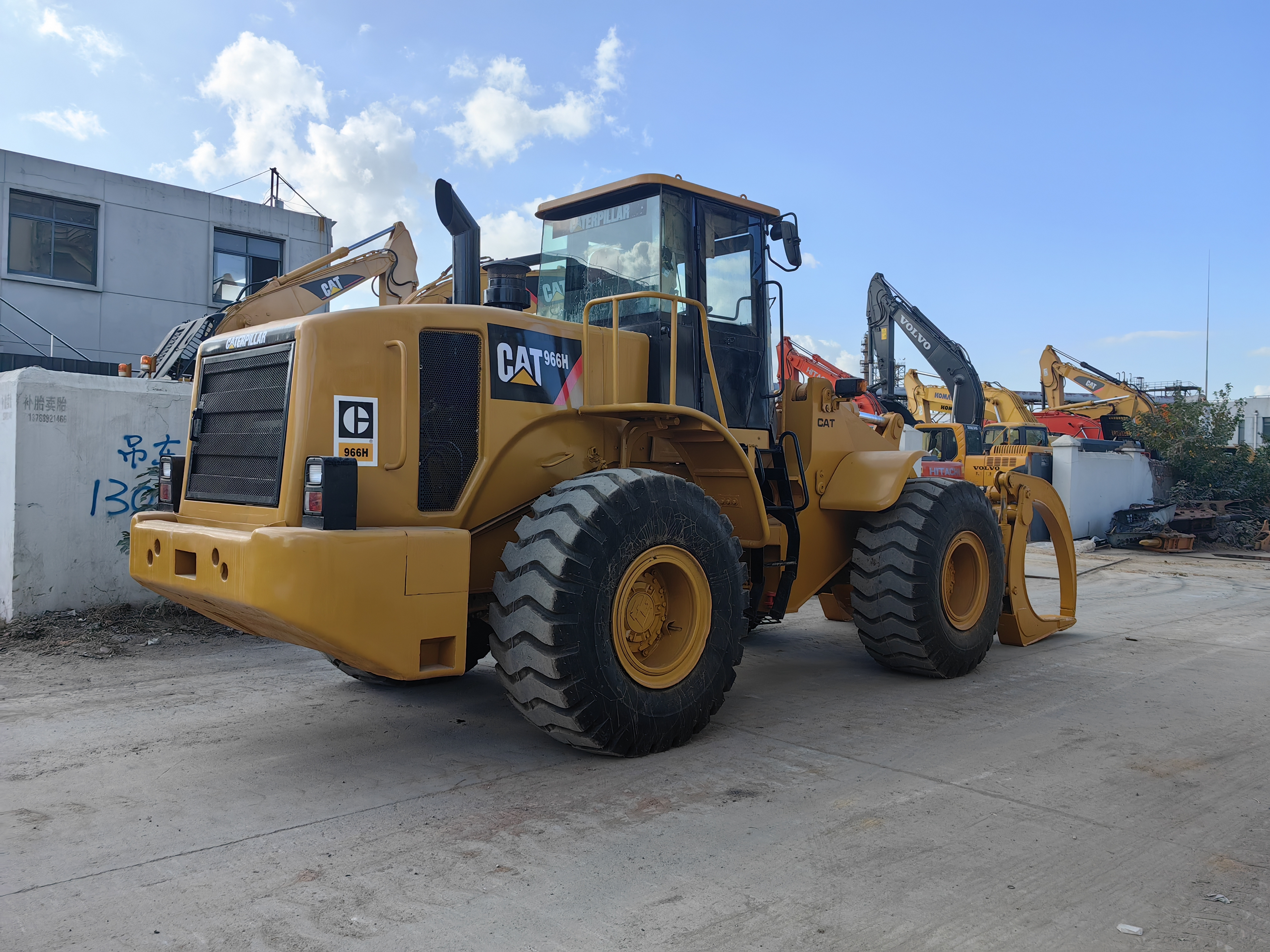 used loader cat 966h with clamp