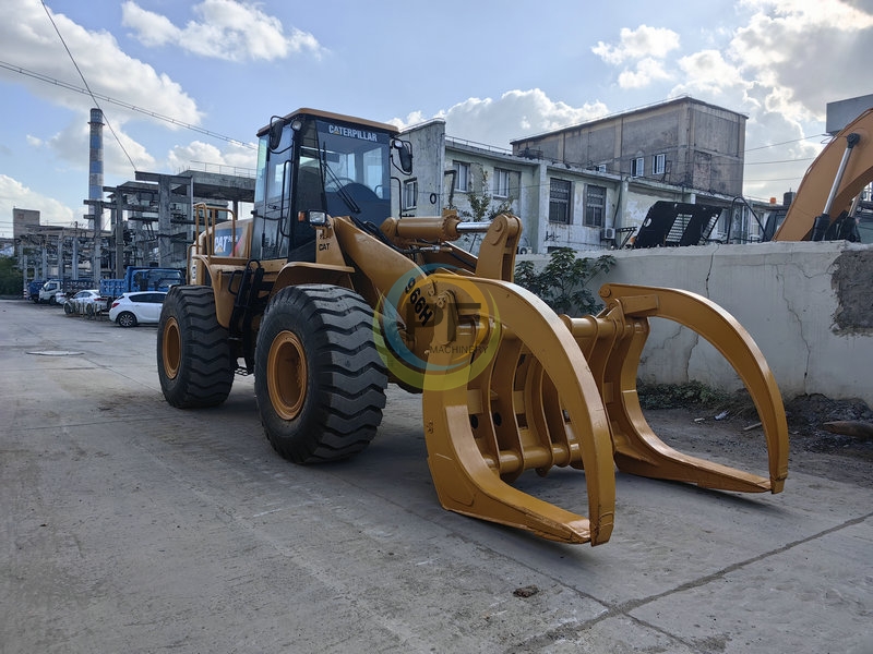 used loader cat 966h with clamp